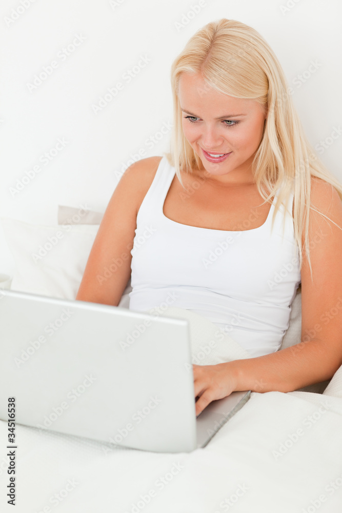 Portrait of a woman using a laptop