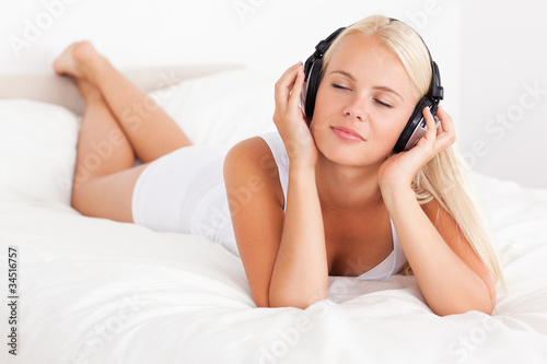 Blonde woman enjoying some music