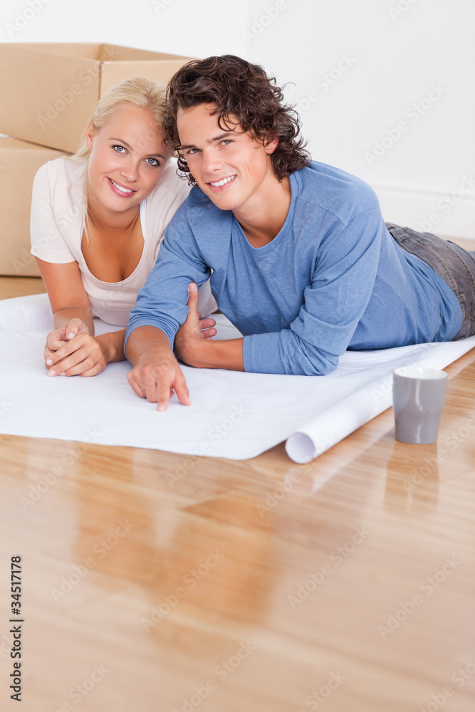 Portrait of a couple getting ready to move in a new house Portrait of a couple getting ready to move in a new house