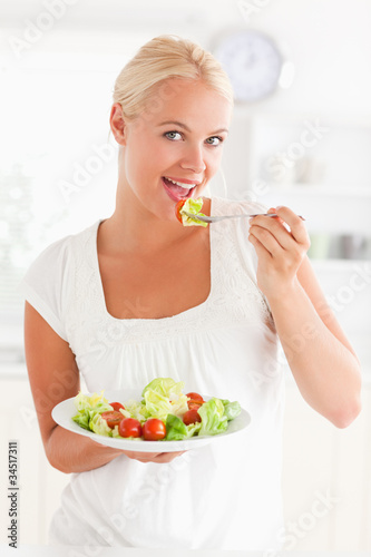 Woman eating a salad