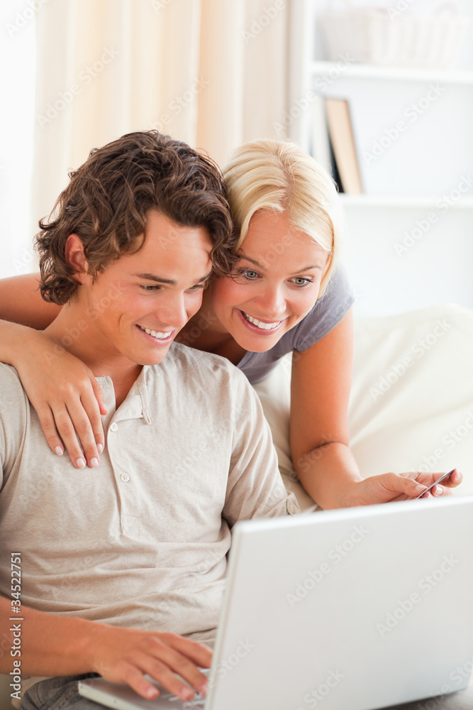 Portrait of a couple buying online Portrait of a couple buying online