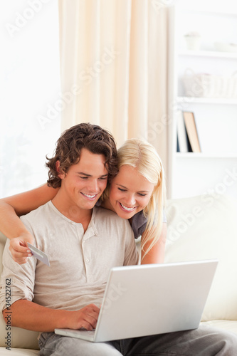 Portrait of a couple purchasing online