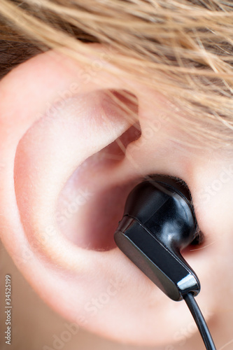 Ear Close Up with Black Earbud