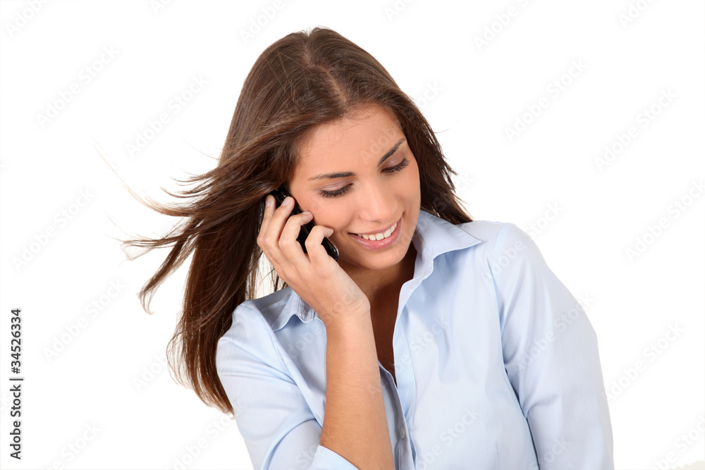 Portrait of beautiful young woman talking on mobilephone Portrait of beautiful young woman talking on mobilephone