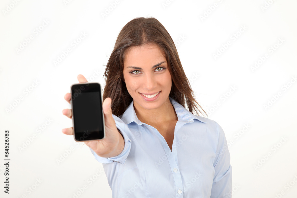 Portrait of beautiful young woman holding smartphone Portrait of beautiful young woman holding smartphone