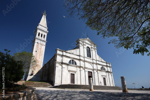 St.Eufemia church and the trees photo