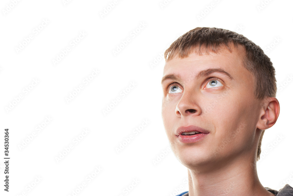 Fototapeta premium Young man having a surprised look isolated on white background