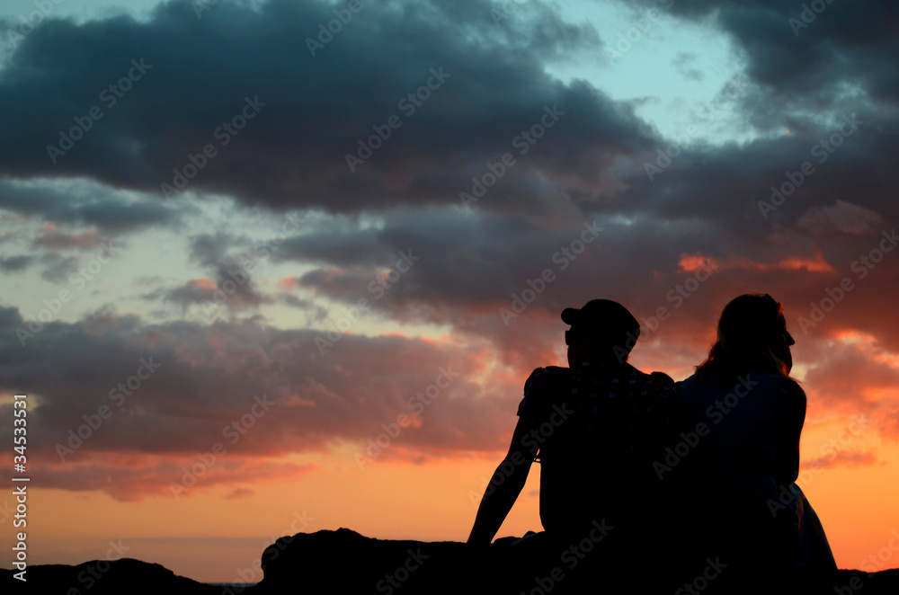 Romantic Image Of A Couple By The Beach At Sunset