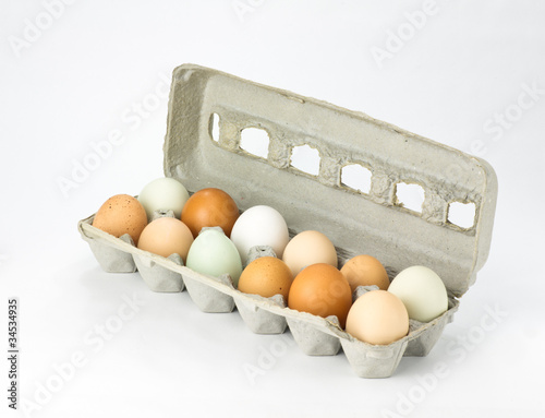 Eggs in cardboard carton assorted colors