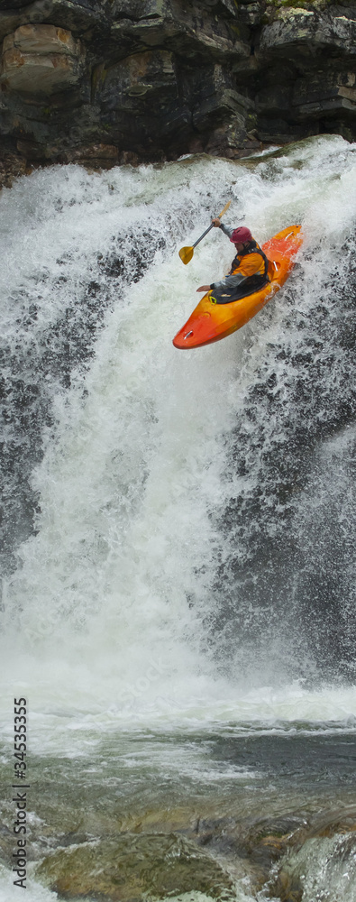 Kayaker in the waterfall