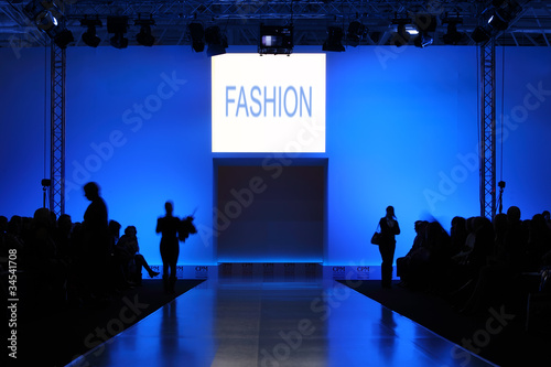 podium before showing new collection of clothing