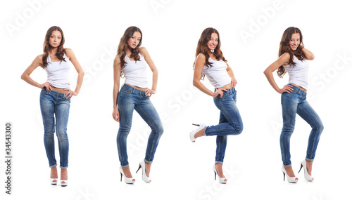 Four young and sexy woman posing in stylish jeans