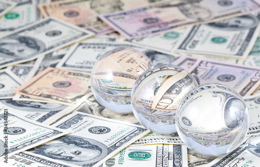 Three crystal spheres against money Three crystal spheres against money