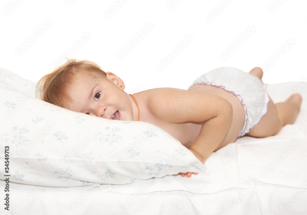 The baby on a bed The baby on a bed