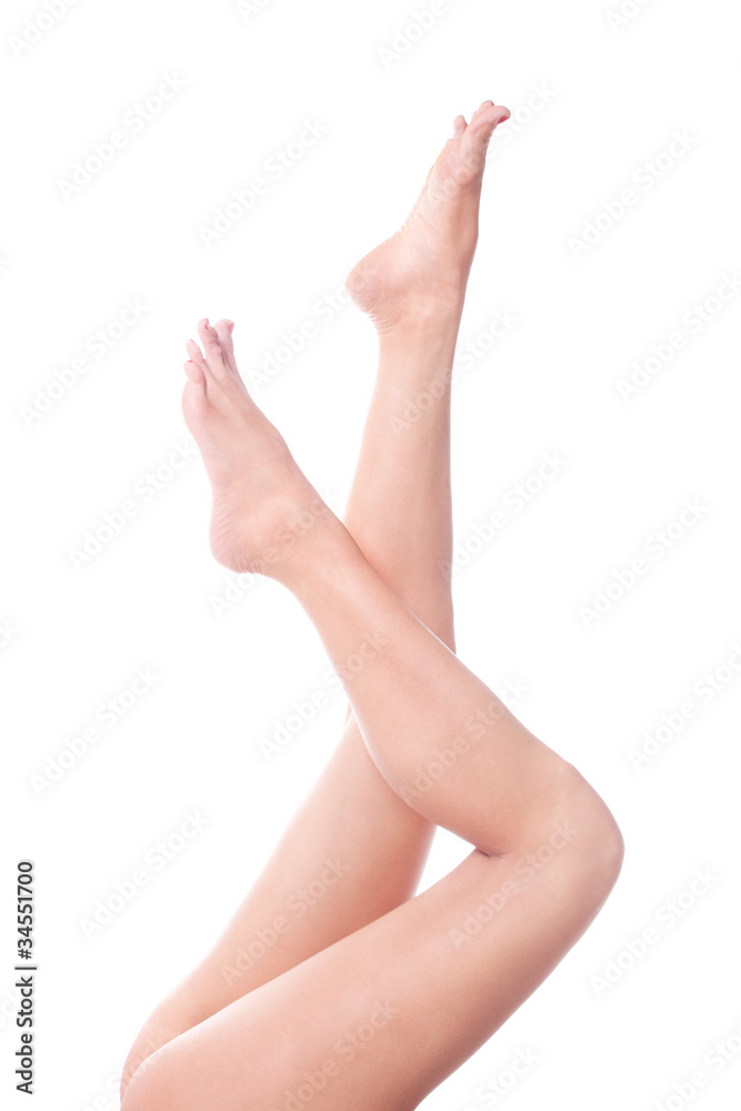 Long pretty woman legs isolated on white Long pretty woman legs isolated on white