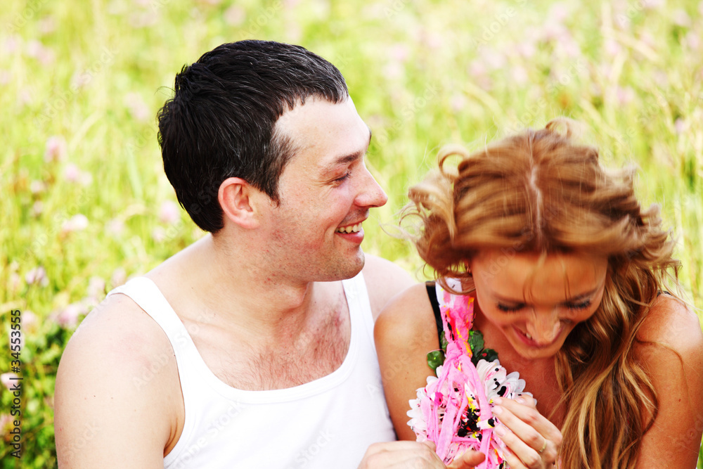 lovers on grass field lovers on grass field