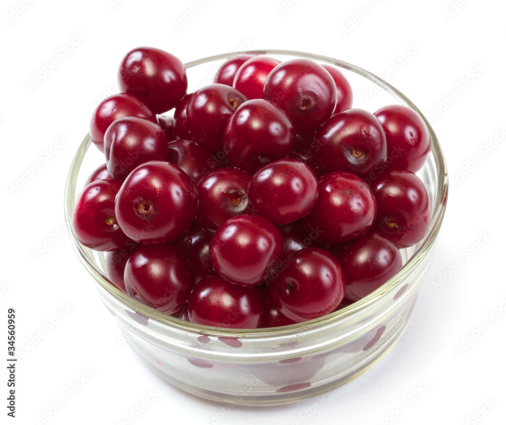 Bowl with ripe cherries. Isolated on a white background. Bowl with ripe cherries. Isolated on a white background.