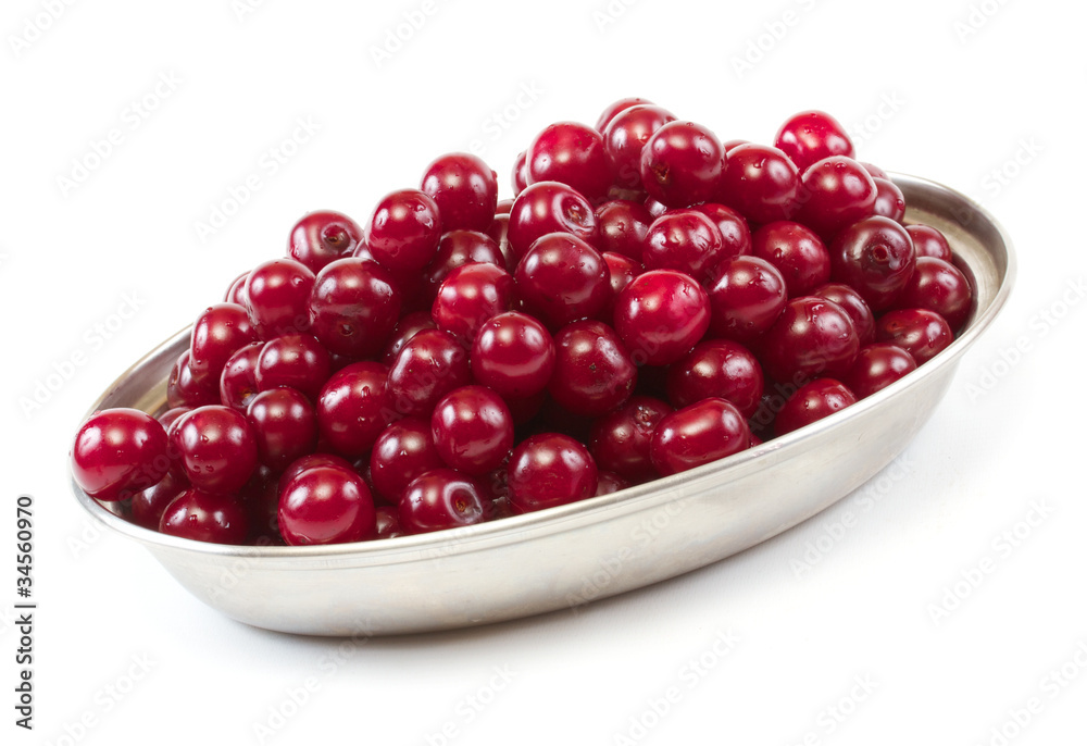 Bowl with ripe cherries. Isolated on a white background. Bowl with ripe cherries. Isolated on a white background.