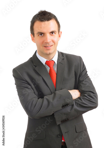 Caucasian businessman with crossed arms.