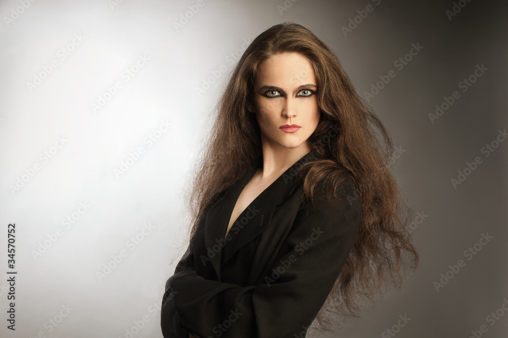 Fototapeta premium Fashion portrait of beautiful woman with long thick hair
