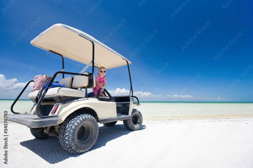 Golf cart at tropical beach