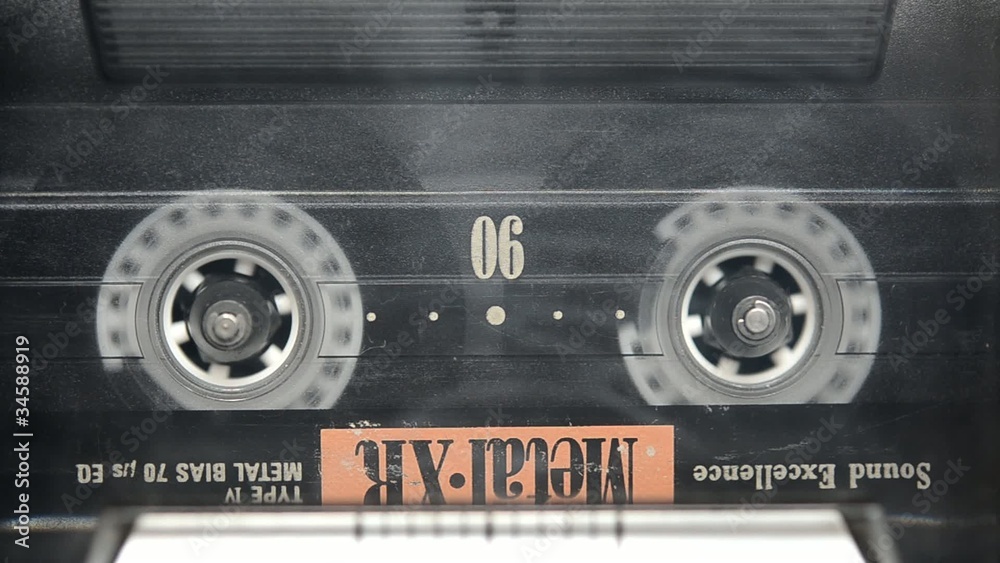 Audio cassette in cassette deck