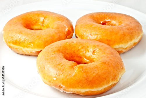 Donuts on white plate