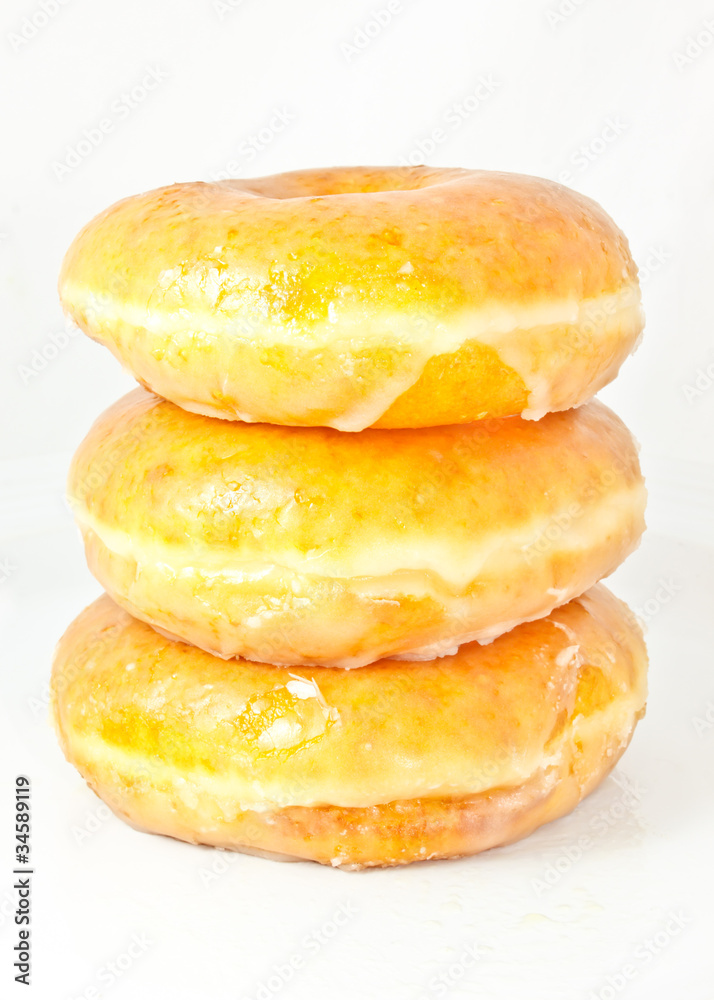 Donuts stacking on white background Donuts stacking on white background