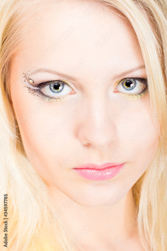 Young beautiful blonde woman with make-up Young beautiful blonde woman with make-up