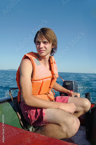 man driving a speedboat