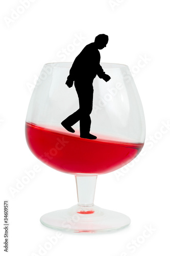 Wine glass and alcoholic man