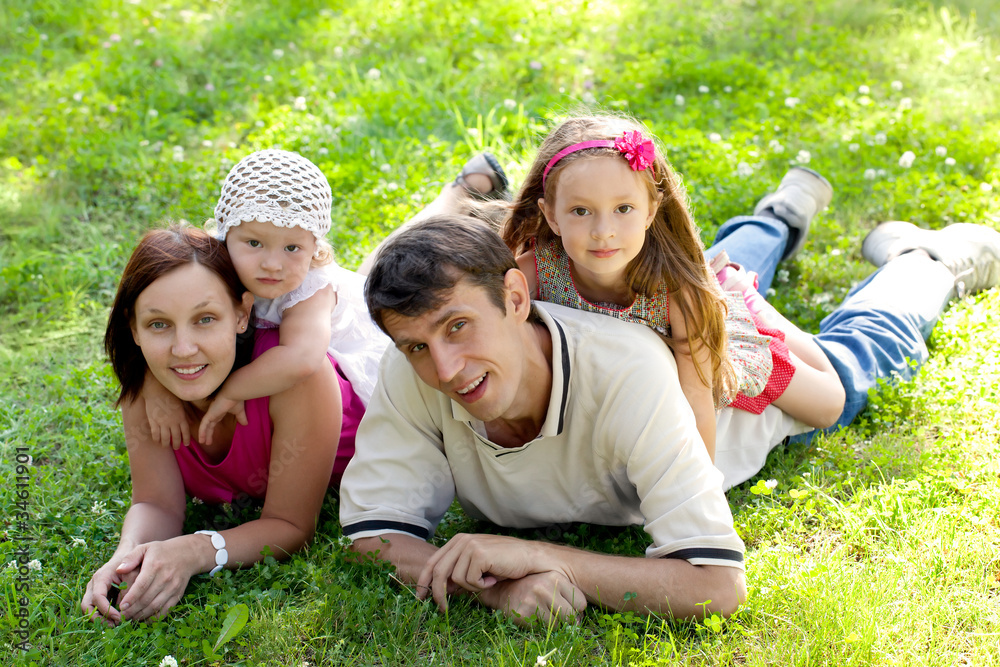 Fototapeta premium Family on grass