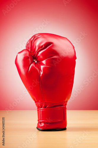 Red boxing gloves on the background © Elnur