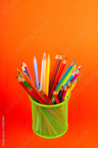 Colourful pencils on the background