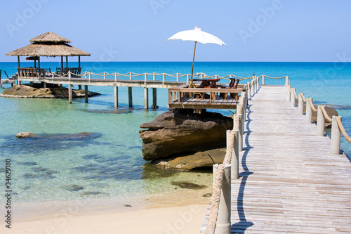 Wooden Pier In Tropical Paradise