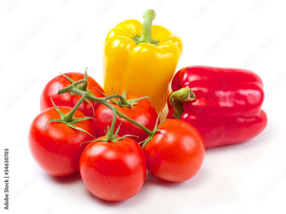 Fresh sweet pepper, tomato. On a white background. Fresh sweet pepper, tomato. On a white background.