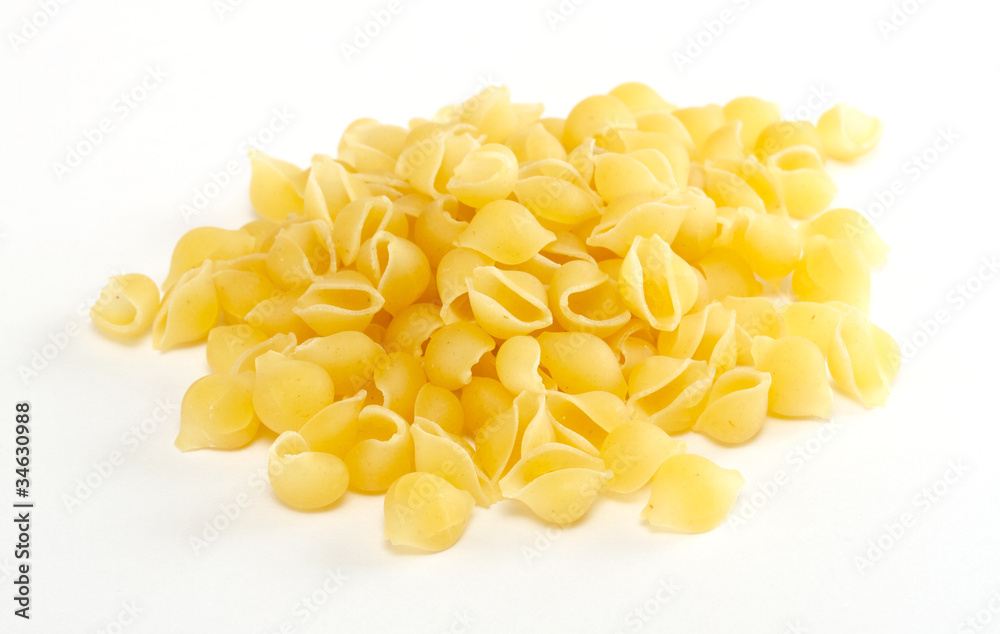 dried italian pasta on white background