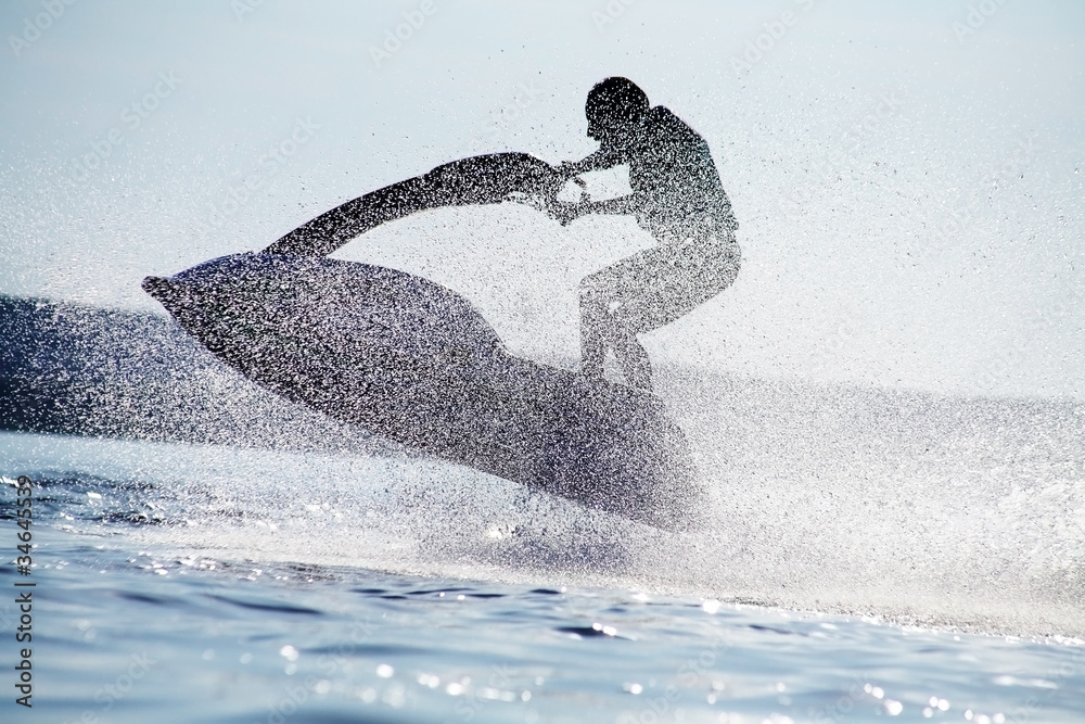 man jumps on the jetski