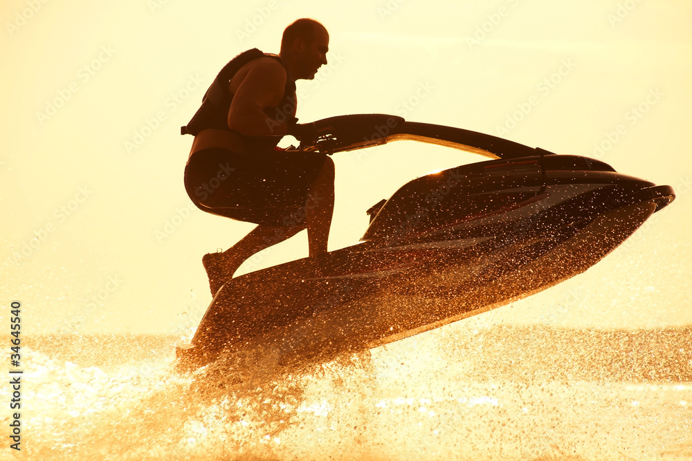 man jumps on the jetski