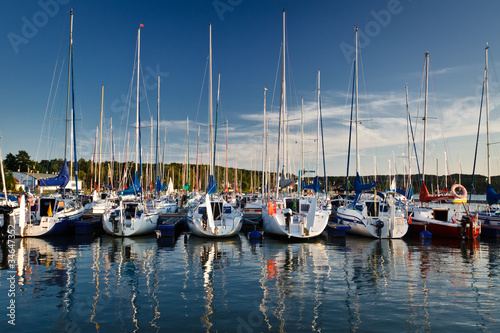 Boats reflection in the lake at summer