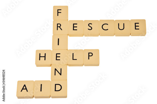 Words help, rescue, friend and aid as crossword. photo