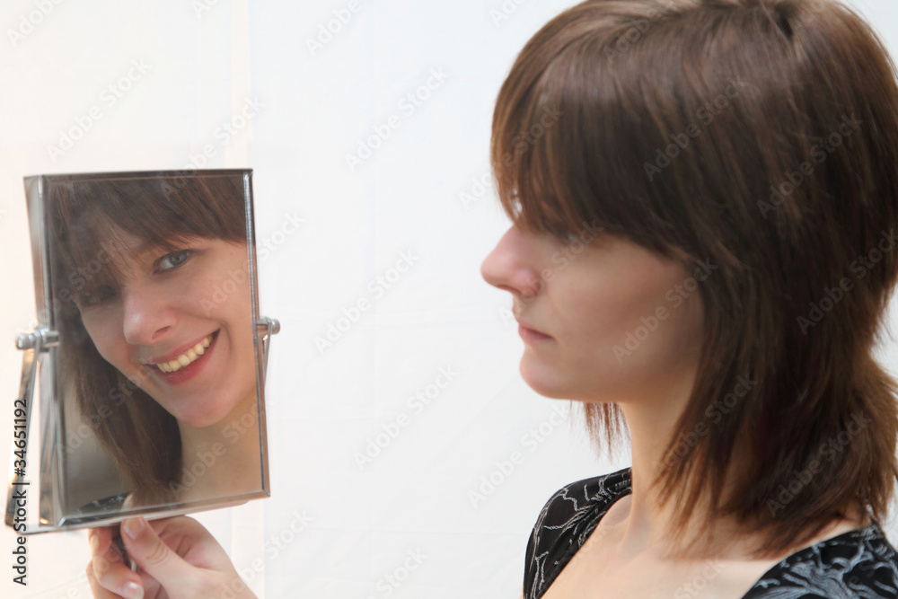 A Pretty Brunnette Model Looking At Her Own Changing Reflection A Pretty Brunnette Model Looking At Her Own Changing Reflection