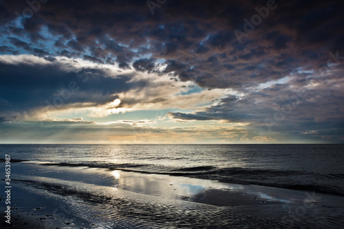 Reflection on the sand over...