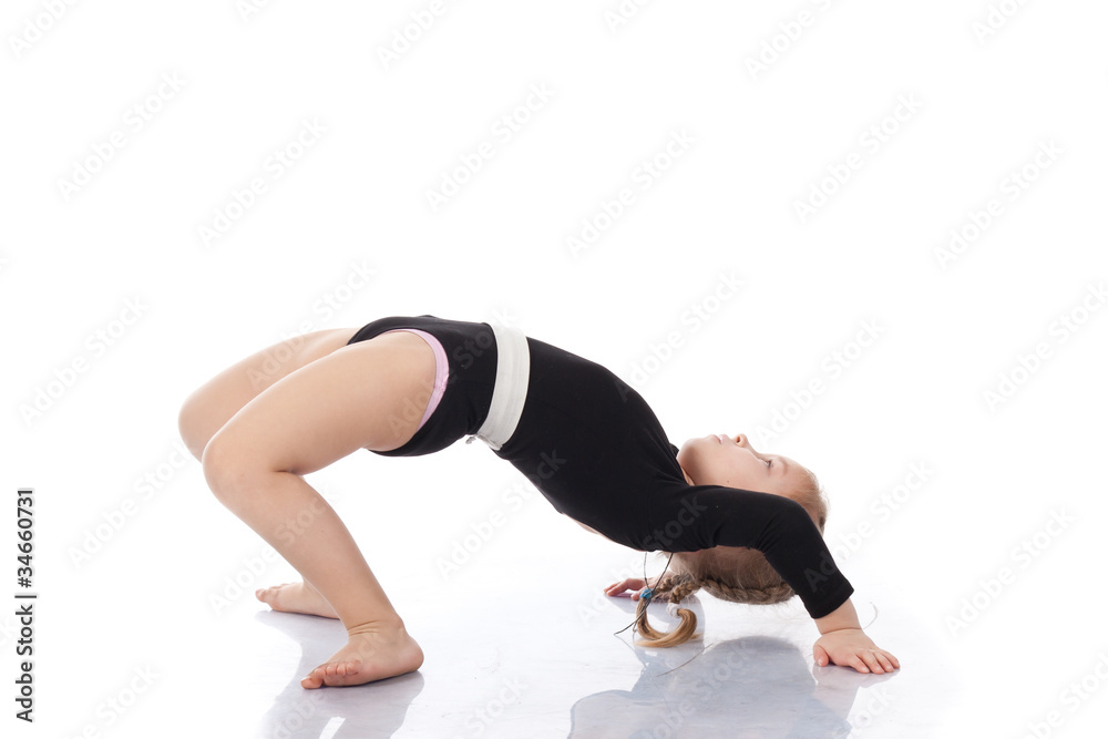 Girl child performing backward bend gymnastics