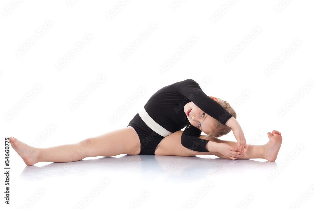 Studio portrait of girl gymnasts, stretching Studio portrait of girl gymnasts, stretching