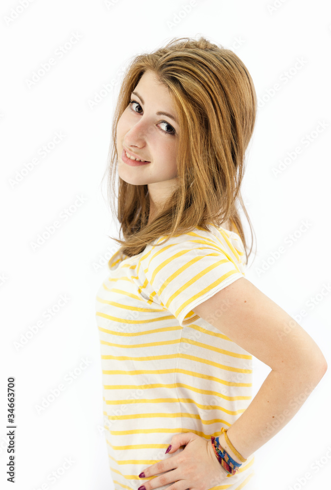 beautiful teenage girl smiling and looking into the camera. beautiful teenage girl smiling and looking into the camera.
