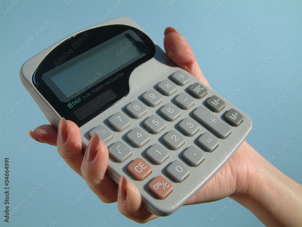 a hand hold a computer