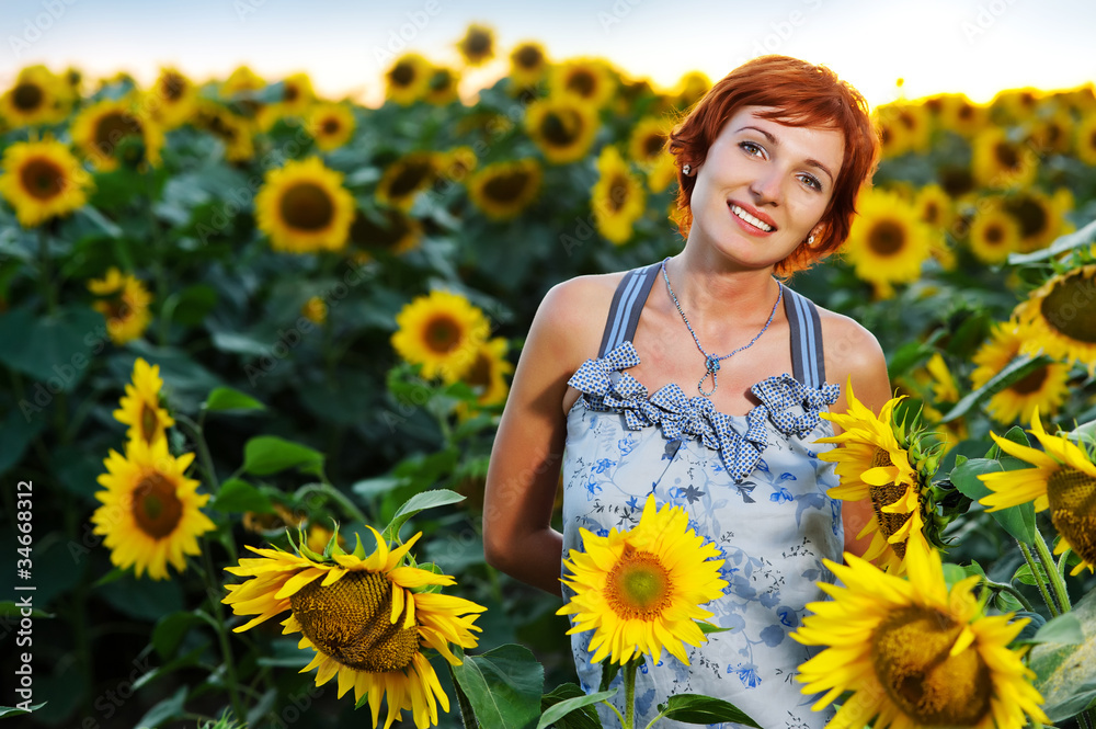woman on blooming sunflower field woman on blooming sunflower field