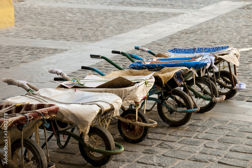 Row of wheelbarrows at the Doha souq photo