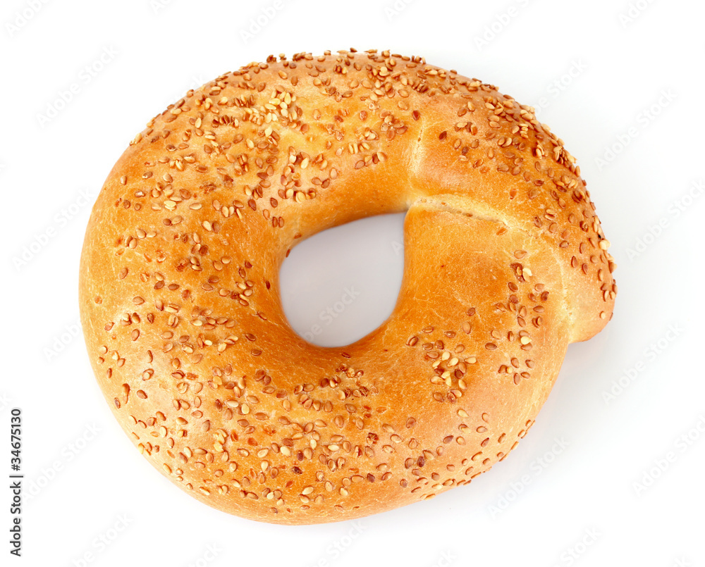 Tasty bagel with sesame seeds isolated on white Tasty bagel with sesame seeds isolated on white